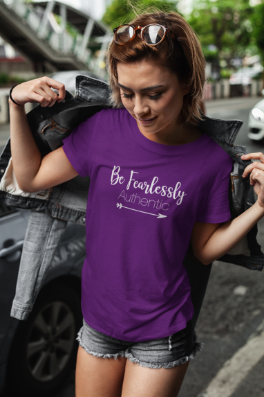 t-shirt-mockup-featuring-a-short-haired-woman-at-a-city-street-417-el(1).png